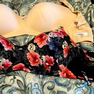 2 torrid curve bras. Black one never worn. In excellent condition 28.00 a piece